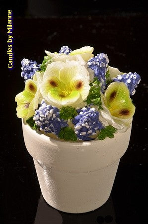 Set mit 4 Blumenkerzen in Steintöpfen