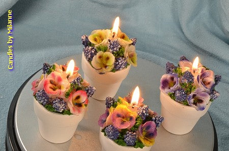 Set mit 4 Blumenkerzen in Steintöpfen