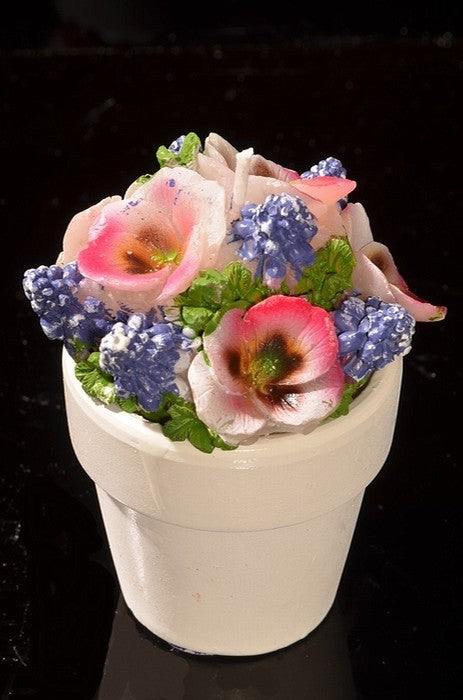 Set mit 4 Blumenkerzen in Steintöpfen