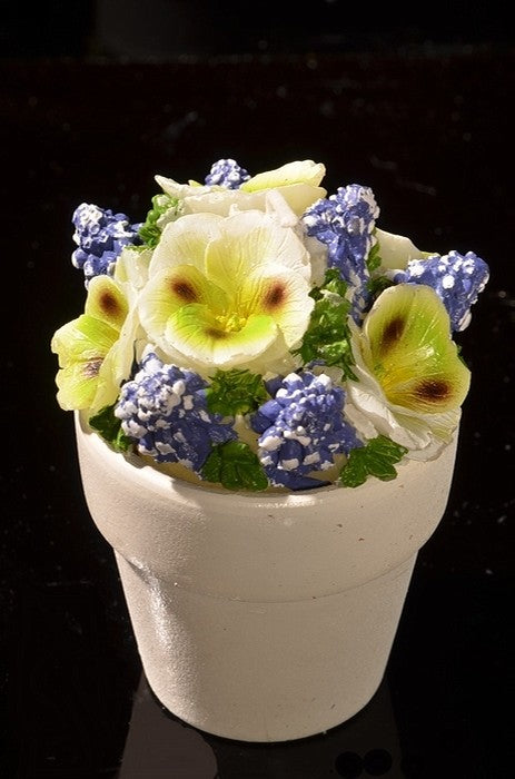 Set mit 4 Blumenkerzen in Steintöpfen